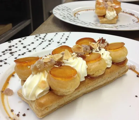 Logis Restaurant Le Dauphin Et Le Du Prieure Hotel Caen